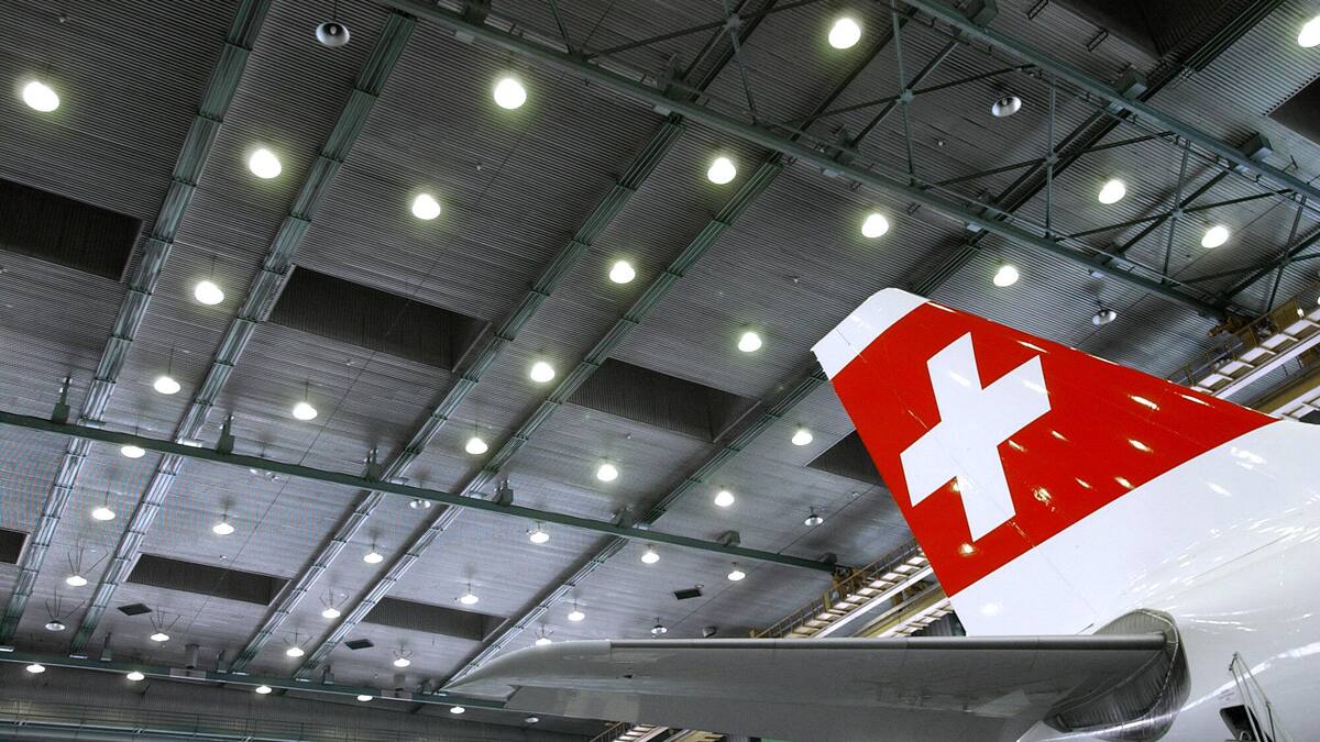 Swiss makes 19 percent less profit - | and still invests