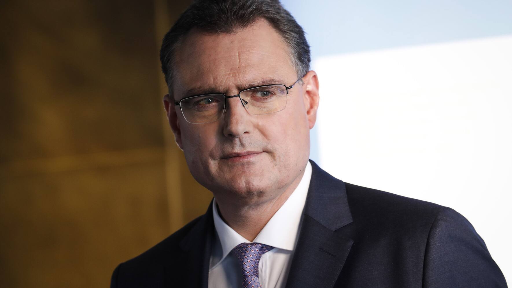 Thomas Jordan, president of the Swiss National Bank (SNB), arrives for a Bloomberg Television interview following the bank's rate announcement news conference in Bern, Switzerland, on Thursday, June 18, 2020. The Swiss National Bank said aggressive foreign exchange interventions remain its main tool for pushing back against the appreciation in the franc caused by the coronavirus pandemic. Photographer: Stefan Wermuth/Bloomberg