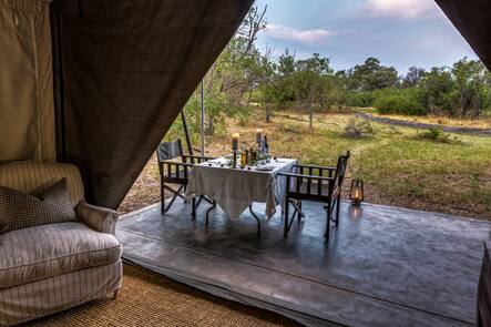 Dining outside of luxury tent. Machaba Camp. Okavango Delta.Botswana