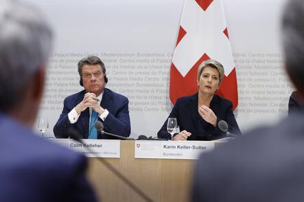 epa10532774 Swiss Finance Minister Karin Keller-Sutter (R), speaks next to Colm Kelleher (L), Chairman UBS, during a press conference in Bern, Switzerland, 19 March 2023. The bank UBS takes over Credit Suisse for 2 billion US dollars. Shares of Credit Suisse lost more than one-quarter of their value on 15 March 2023, hitting a record low after its biggest shareholder, the Saudi National Bank, told outlets that it would not inject more money into the ailing Swiss bank. EPA/PETER KLAUNZER