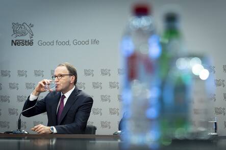 Nestle's CEO Ulf Mark Schneider drinks a glas of water during the 2019 full-year results press conference of the food and drinks giant Nestle, in Vevey, Switzerland, Thursday, February 13, 2020. (KEYSTONE/Laurent Gillieron)