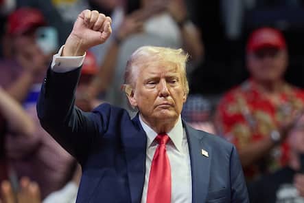 epa11489843 Republican presidential nominee Donald J. Trump holds his fist up after speaking at his first joint rally with Republican vice presidential nominee Senator JD Vance at Van Andel Arena in Grand Rapids, Michigan, USA, 20 July 2024. EPA/ALLISON DINNER