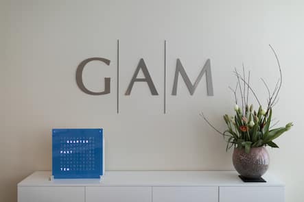 The GAM logo pictured in an office at the Prime Tower, a skyscraper, where the pure play asset management group GAM is headquartered, in Zurich, Switzerland, on March 13, 2017. (KEYSTONE/Gaetan Bally)