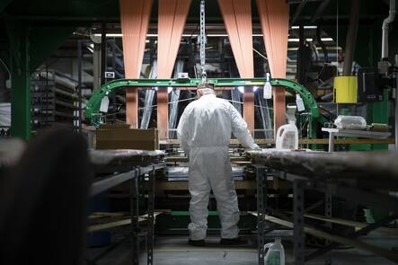 A workman operates a loom manufacturing composite parts for joints in aircrafts at Bally Ribbon Mills in Bally, Pa., Thursday, March 23, 2017. (AP Photo/Matt Rourke)