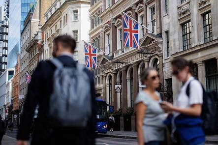 epa11612248 People walk in the financial district of the City of London, in London, Britain, 18 September 2024. International Equal Pay Day, observed on 18 September, highlights ongoing efforts to close the global gender pay gap due to longstanding inequalities and challenges in achieving equal pay for women. According to the United Nations, women are paid less than men, with the gender pay gap estimated at around 20 per cent globally. EPA/TOLGA AKMEN