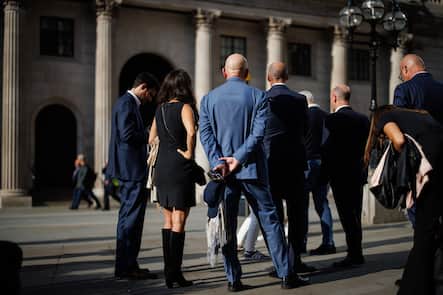 epa11612254 People walk in the financial district of the City of London, in London, Britain, 18 September 2024. International Equal Pay Day, observed on 18 September, highlights ongoing efforts to close the global gender pay gap due to longstanding inequalities and challenges in achieving equal pay for women. According to the United Nations, women are paid less than men, with the gender pay gap estimated at around 20 per cent globally. EPA/TOLGA AKMEN