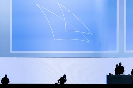 Swiss bank Credit Suisse Chairman Axel P. Lehmann, center, leaves the stage after theannual shareholders' meeting of the Swiss banking group on Tuesday, April 4, 2023 in Zurich, Switzerland. Swiss Bank Credit Suisse was rescued in a three billion dollars purchase by its Swiss rival UBS in a government-backed deal. (KEYSTONE/Michael Buholzer)