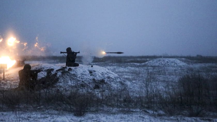 In this image taken from video provided by the Russian Defense Ministry Press Service on Tuesday, Jan. 25, 2022, Russian soldiers attend a military exercising at a training ground in Russia. (Russian Defense Ministry Press Service via AP)