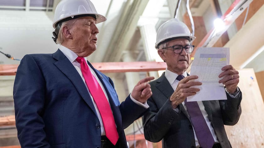 (FILES) US President Donald Trump points to a cost sheet as he speaks with Federal Reserve chair Jerome Powell (R) as he visits the Federal Reserve in Washington, DC, on July 24, 2025. Federal Reserve Chairman Jerome Powell said on January 11, 2026 that the central bank had been subpoenaed by the US Justice Department, blasting the move as part of President Donald Trump's extraordinary pressure campaign on US monetary policy decisions. (Photo by ANDREW CABALLERO-REYNOLDS / AFP)