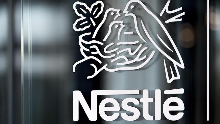 FILE - Nestle's logo is displayed on a window in Vevey, Switzerland, Feb. 14, 2019. (Laurent Gillieron/Keystone via AP, File) Nestle Artificial Colors