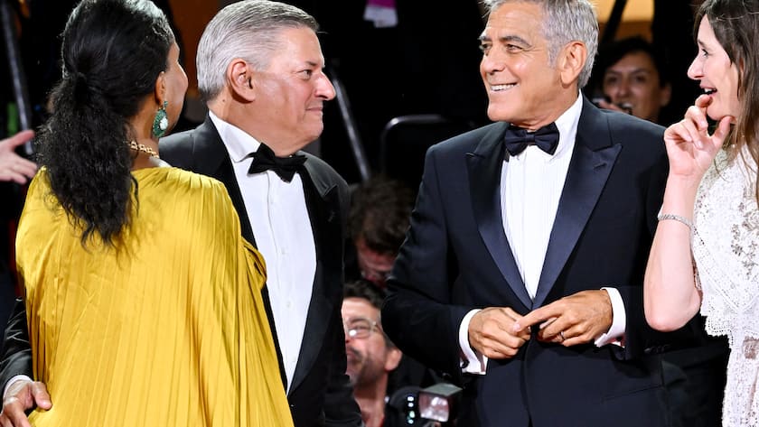 Ted Sarandos, George Clooney at the "Jay Kelly" red carpet during The 82nd Venice International Film Festival on August 28, 2025 in Venice, Italy. (Photo by Earl Gibson III/Deadline via Getty Images)