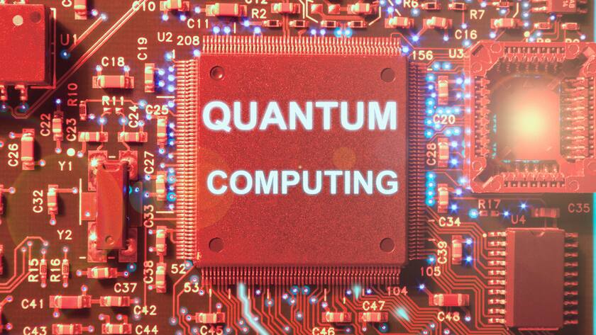 Circuit board showing the concept of quantum computation illuminated in reddish tonalization