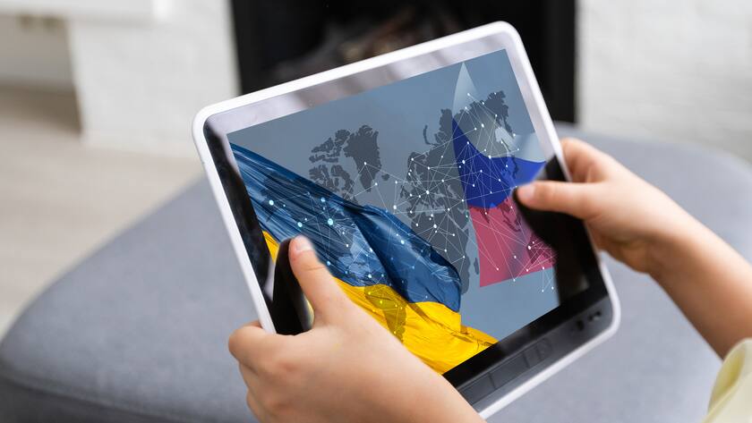 tablet with war ukraine and russia