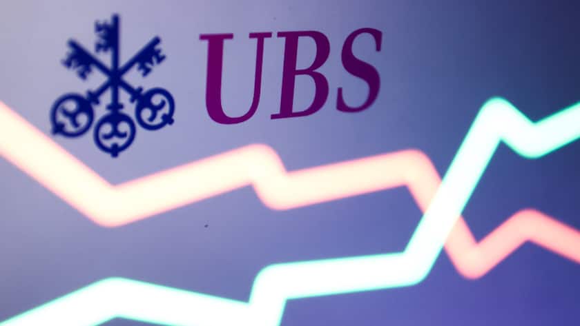 UBS Credit Suisse Takeover Photo Illustrations UBS logo displayed on a laptop screen and an illustrative stock chart displayed on a laptop screen are seen in this multiple exposure illustration photo taken in Krakow, Poland on March 19, 2023. Krakow Poland PUBLICATIONxNOTxINxFRA Copyright: xJakubxPorzyckix originalFilename: porzycki-ubscredi230319_np8Lc.jpg