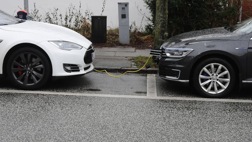 Copenhagen/Denmark./30 Decemeber 2021/ Various eelctric brand autos american tesla eectric car and German volks wagen electric cars charging at charge point in Copenhagen. Photo..Francis Joseph Dean/Dean Pictures