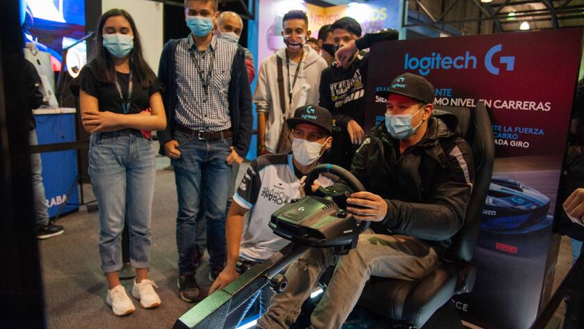 October 17, 2021, Bogota, Cundinamarca, Colombia: People play and enjoy a driving simulator from Logitech during the fourth day of the SOFA Salon del Ocio y la Fantasia 2021, a fair aimed to the geek audience in Colombia that mixes Cosplay, gaming, superhero and movie fans from across Colombia, in Bogota, Colombia on October 17, 2021. Bogota Colombia - ZUMAvp1_ 20211017_zia_vp1_007 Copyright: xChepaxBeltranx