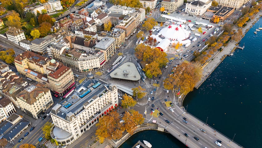 Aerial view of the Zurich Quay bridge where the Limmat river meets lake Zurich and the Bellevue square, an upscale district of the largest city in Switzerland in autumn