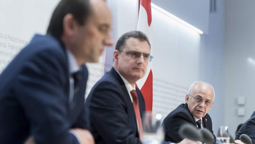 Swiss Federal councillor Ueli Maurer, Thomas Jordan, chairman of the governing board of the Swiss National Bank, and Mark Branson, Chief Executive Officer of FINMA, Switzerland's financial-markets regulator, from right, brief the media about the latest economic measures to fight the Covid-19 Coronavirus pandemic, on Wednesday, March 25, 2020 in Bern, Switzerland. (KEYSTONE/Alessandro della Valle)