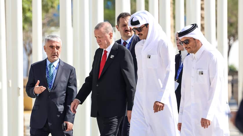 Heads of states, including presidnet of Turkey, Recep Tayyip Erdoan third left arrive dor the opening session of worlds leaders summit during the COP28, UN Climate Change Conference
