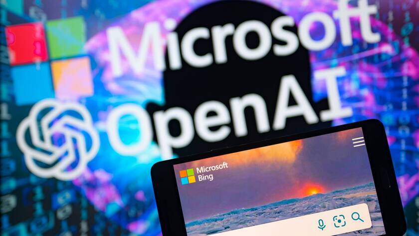 Microsoft - Open AI Illustration Microsoft and OpenAI seen on screen with Bing search engine app on mobile in this photo illustration.