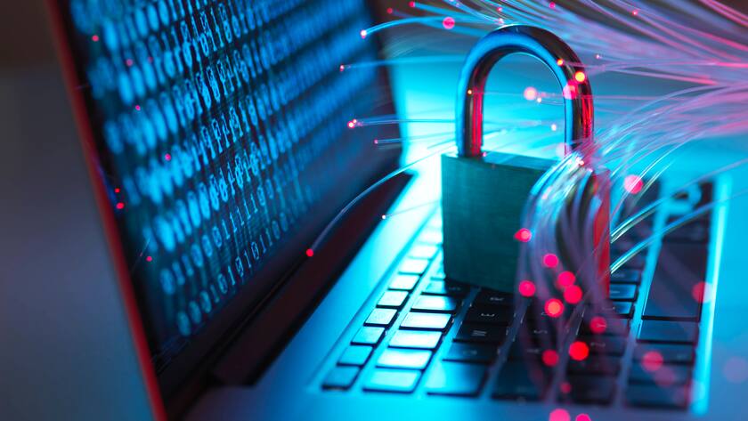 Padlock protecting laptop from computer virus represented by optical fibers PUBLICATIONxINxGERxSUIxAUTxHUNxONLY ABRF00649