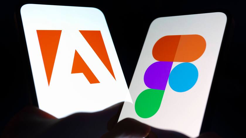 Zwei Smartphones eines mit dem Adobe-Logo und eines mit dem Figma-Logo.