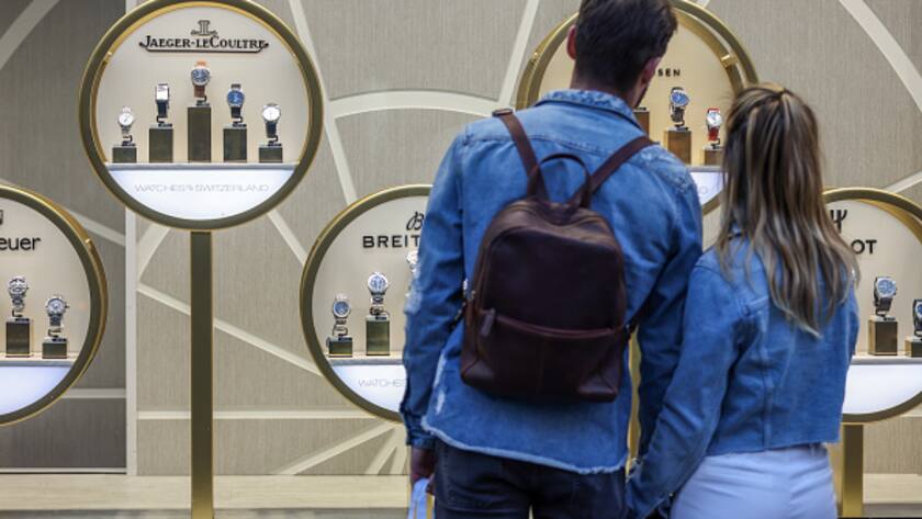Shoppers look at watches in a window display at the Watches of Switzerland Group Plc store on Regent Street in central London, U.K., on Thursday, March 24, 2022. The Office for National Statistics are due to release the latest U.K. retail sales figures on Friday. Photographer: Hollie Adams/Bloomberg via Getty Images