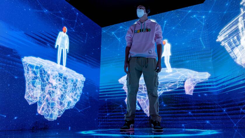 January 23, 2022, Madrid, Spain: A kid creates his Avatar at FITUR. HELIXA Experience Center is the technological and artistic installation in the heart of the FITUR fair. It will be the first to offer visitors the chance to create their own avatar in real time. This avatar is a personalised, hyper-realistic, 3D, seriezero digital twin that they can use to interact on digital platforms and in the metaverse. Madrid Spain - ZUMAs197 20220123_zaa_s197_083 Copyright: xGuillermoxGutierrezxCarrascalx