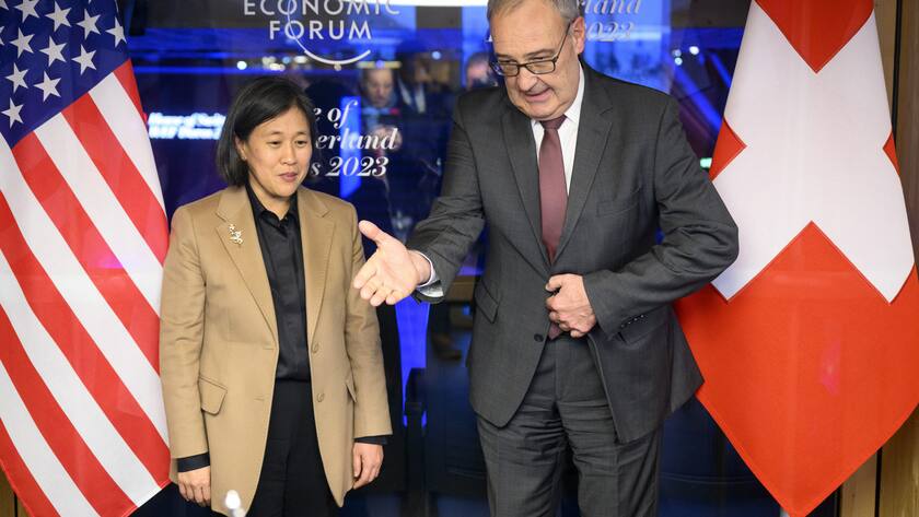 Switzerland's Economy Minister Guy Parmelin, right, speaks with United States Trade Representative Katherine Tai, left, prior to a bilateral meeting in the House of Switzerland, HoS, on the sideline of the 53rd annual meeting of the World Economic Forum, WEF, in Davos, Switzerland, Thursday, January 19, 2023. The meeting brings together entrepreneurs, scientists, corporate and political leaders in Davos under the topic "Cooperation in a Fragmented World" from 16 to 20 January. (KEYSTONE/Laurent Gillieron)