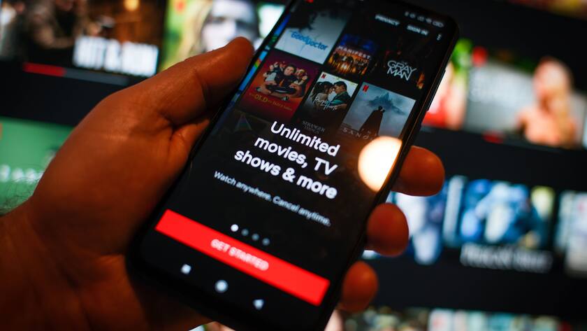 The Netflix app is seen running on a mobile phone in this photo illustration.