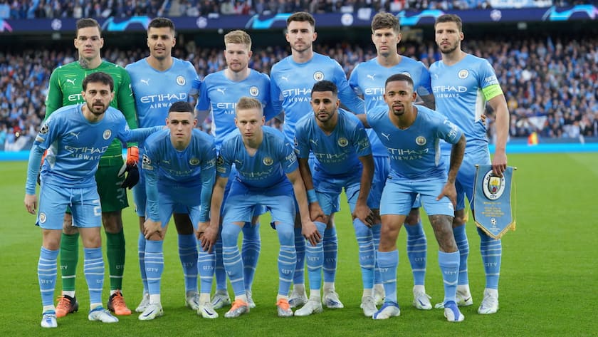 Manchester City players pose for a team photo ahead of the Champions League semi final, first leg soccer match between Manchester City and Real Madrid at the Etihad stadium in Manchester, England, Tuesday, April 26, 2022. (AP Photo/Jon Super)