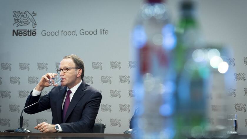 Nestle's CEO Ulf Mark Schneider drinks a glas of water during the 2019 full-year results press conference of the food and drinks giant Nestle, in Vevey, Switzerland, Thursday, February 13, 2020. (KEYSTONE/Laurent Gillieron)