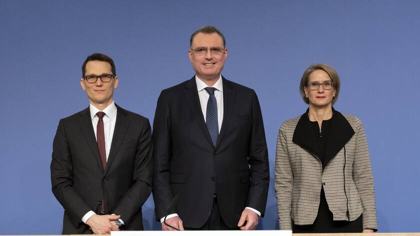 Swiss National Bank's (SNB) Vice Chairman of the Governing Board Martin Schlegel, Swiss National Bank's (SNB) Chairman of the Governing Board Thomas Jordan, and Swiss National Bank's (SNB) Member of the Governing Board Andrea Maechler, from left, take a pose after an end-of-year press conference of Swiss National Bank (SNB BNS), in Bern, Switzerland, Thursday, December 15, 2022. (KEYSTONE/Anthony Anex)
