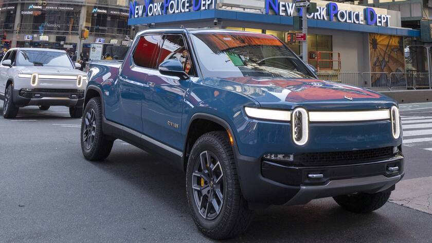 IMAGE DISTRIBUTED FOR RIVIAN AUTOMOTIVE, LLC - Rivian R1T all-electric truck in Times Square on listing day, on Wednesday, Nov. 10, 2021 in New York. (Ann-Sophie Fjello-Jensen/AP Images for Rivian Automotive, LLC)