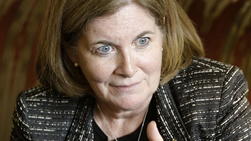 Esther George, president and chief executive officer of the Federal Reserve Bank of Kansas City, speaks with a colleague during the Jackson Hole Economic Policy Symposium at the Jackson Lake Lodge in Grand Teton National Park near Jackson, Wyo. Friday, Aug. 22, 2014. (AP Photo/John Locher)