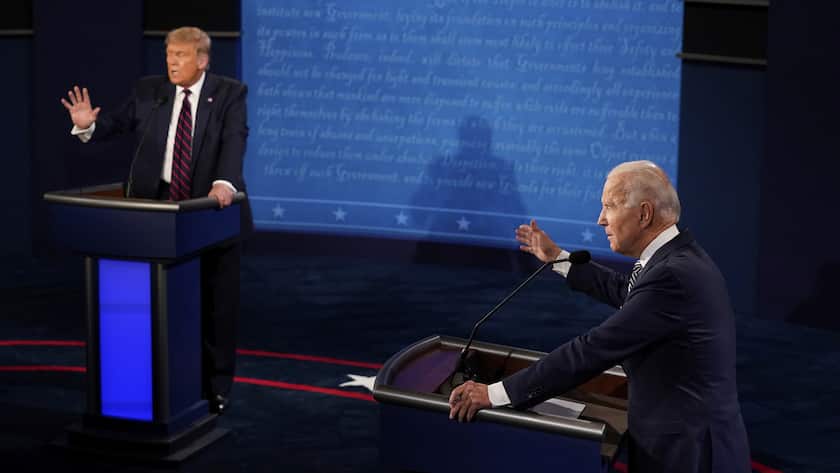 FILE - President Donald Trump and Democratic presidential candidate former Vice President Joe Biden exchange points during their first presidential debate at Case Western University and Cleveland Clinic, in Cleveland, Ohio, Sept. 29, 2020. (AP Photo/Morry Gash, Pool, File)