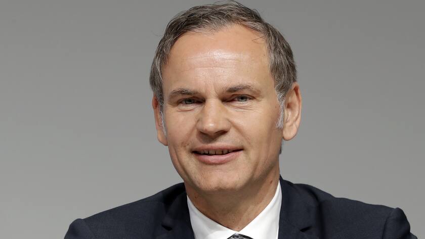 Oliver Blume, CEO of Porsche AG, poses for the media prior to the shareholders' meeting of the Volkswagen stock company in Berlin, Germany, Thursday, May 3, 2018. (AP Photo/Michael Sohn)
