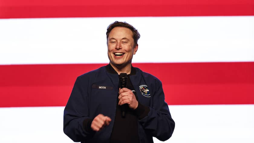 Elon Musk laughs during a town hall Sunday, March 30, 2025, in Green Bay, Wis. (AP Photo/Jeffrey Phelps)