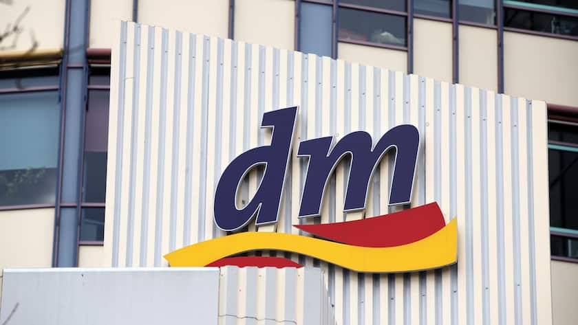 epa06275411 A view of a company logo of the 'dm' drugstore chain on the main building of the 'dm-drogerie markt GmbH & Co' company in Karlsruhe, Germany, 19 October 2017. The largest drugstore chain in Europe the same day announced its preliminary business figures for the full year of 2016 and a part of 2017. EPA/RONALD WITTEK