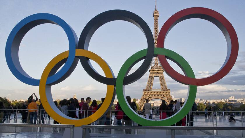 FILE - The Olympic rings are set up at Trocadero plaza that overlooks the Eiffel Tower, a day after the official announcement that the 2024 Summer Olympic Games will be in the French capital, in Paris, France, on Sept. 14, 2017. One year after the invasion of Ukraine began, Russia's reintegration into the world of sports threatens to create the biggest rift in the Olympic movement since the Cold War.(AP Photo//Michel Euler, File)