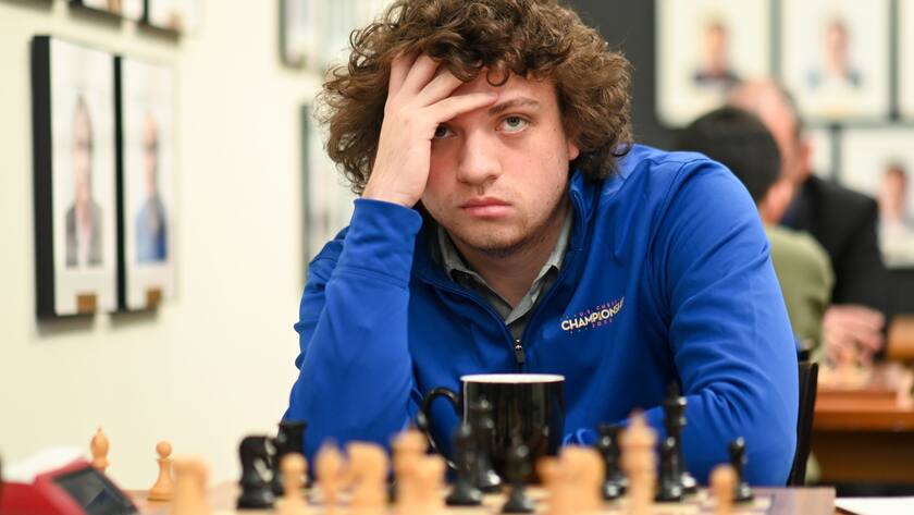 epaselect epa10244174 US chess grandmaster Hans Niemann plays against Armenian chess grandmaster Levon Aronian (not pictured) during Round 8 of the US Chess Championships at the St. Louis Chess Club in St. Louis, Missouri, USA, 13 October 2022 (issued 14 October 2022). According to reports Chess.com claims that Niemann has 'likely cheated' in over 100 games. EPA/MICHAEL THOMAS