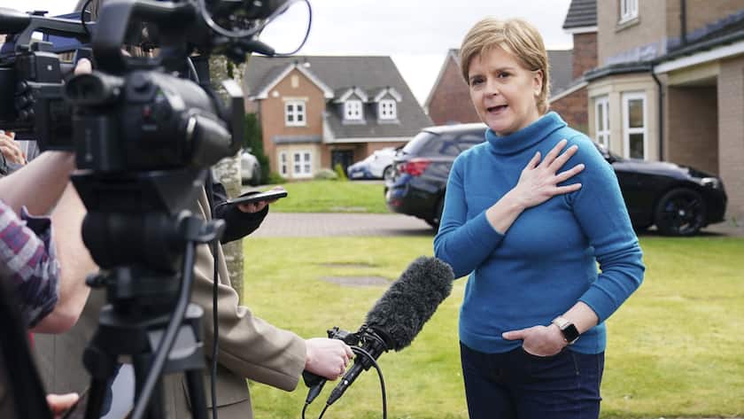Former leader of the Scottish National Party (SNP) Nicola Sturgeon speaks to the media outside her home in Uddingston, Glasgow, Scotland, Saturday, April 8, 2023. The husband of former Scottish first minister and Scottish National Party leader Nicola Sturgeon was released without charges after being arrested in a party finance probe. (Jane Barlow/PA via AP)