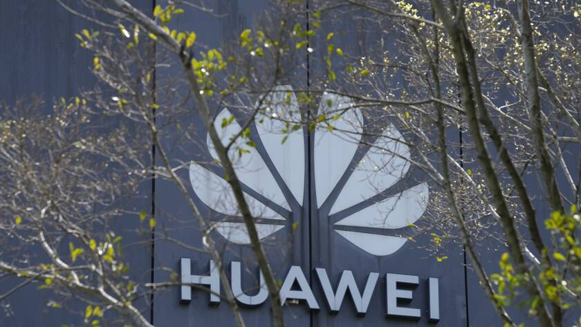 The Huawei brand logo is seen on a building in the sprawling Huawei headquarters campus in Shenzhen, China, Saturday, Sept. 25, 2021. Two Canadians detained in China on spying charges were released from prison and flown out of the country on Friday, Prime Minister Justin Trudeau said, just after a top executive of Chinese communications giant Huawei Technologies reached a deal with the U.S. Justice Department over fraud charges and flew to China. (AP Photo/Ng Han Guan)