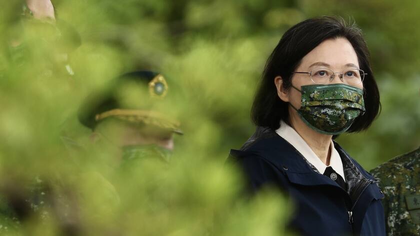 epa09698879 Taiwan President Tsai Ing-wen reviews military personnel during her visit at a military base in Taitung, Taiwan, 21 January 2022. President Tsai Ing-wen pledged to strengthen Taiwan?s defense capabilities amidst the rising military tension between China and Taiwan. EPA/RITCHIE B. TONGO