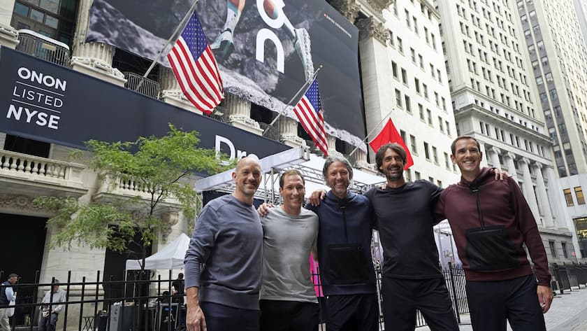 On executives pose for photos outside the New York Stock Exchange before the company's IPO, Wednesday, Sept. 15, 2021. They are, from left: David Allemann, Marc Maurer, Olivier Bernhard, Caspar Coppetti, and Martin Hoffmann. (AP Photo/Richard Drew)