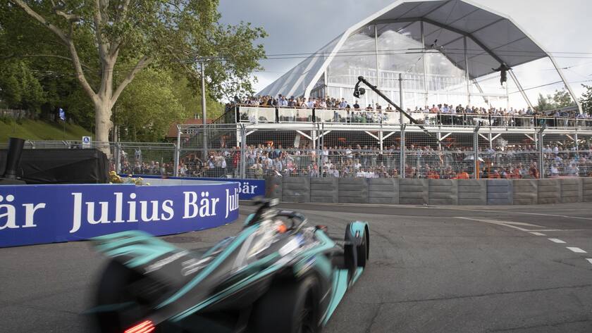 British driver Alex Lynn, Panasonic Jaguar Racing, passes the VIP tribune during the Bern E-Prix race, the eleventh stage of the ABB FIA Formula E championship, in Bern Switzerland, Saturday, June 22, 2019. (KEYSTONE/Peter Klaunzer)