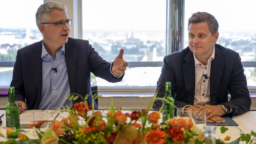Severin Schwan, CEO and designated Chairman of the Board of Directors of Swiss pharmaceutical company Roche, left, and Thomas Schinecker CEO Roche Diagnostics and designated CEO, right, speak about the 2022 half-year results at the Roche Tower in Basel, Switzerland, on Thursday, July, 2022. (KEYSTONE/Georgios Kefalas)