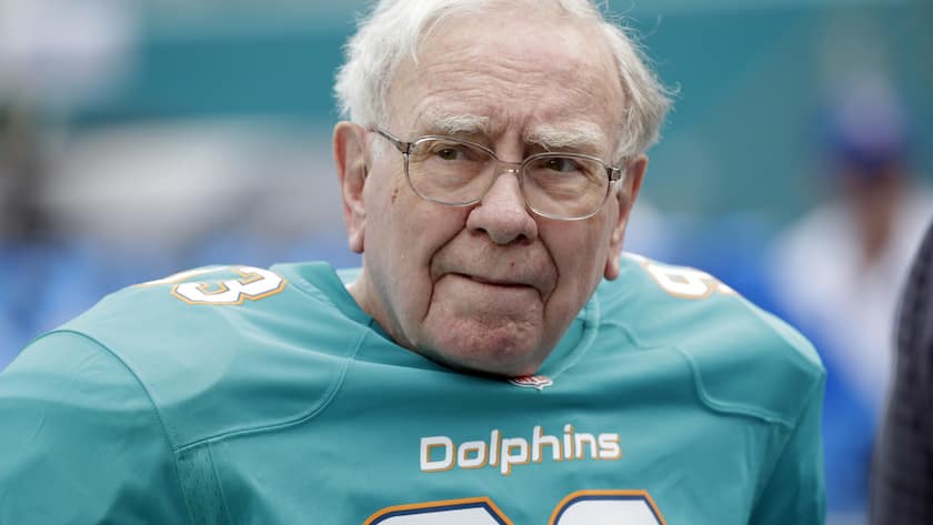 American business magnate Warren Buffett looks from the sidelines before an NFL football game between the Miami Dolphins and the Buffalo Bills, Sunday, Sept. 27, 2015 in Miami Gardens, Fla. (AP Photo/Wilfredo Lee)
