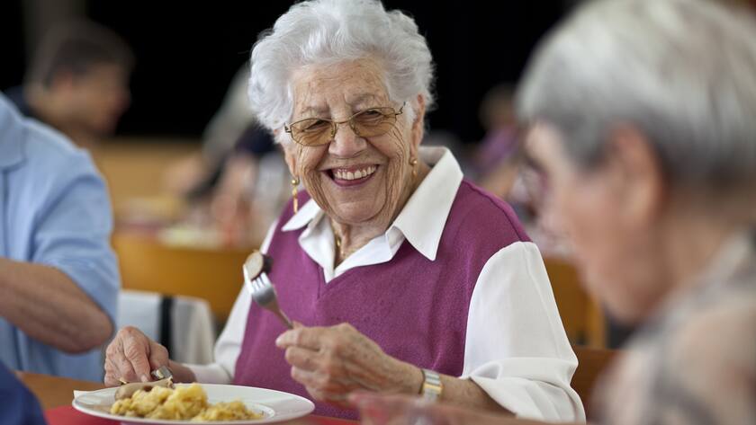 Elderly people come together for a pensioners' afternoon with lunch and card games at Saint Andreas parish in Uster in the canton of Zurich, Switzerland, pictured on June 15, 2011. (KEYSTONE/Martin Ruetschi)