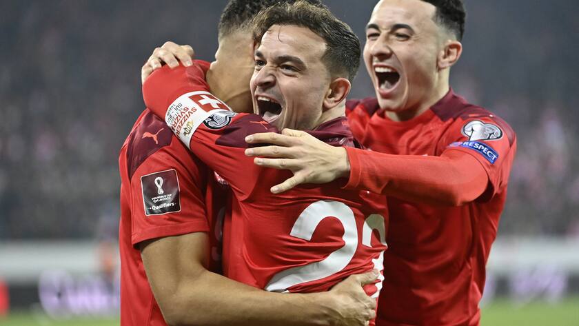 From left, Switzerland's forward Noah Okafor, Switzerland's midfielder Xherdan Shaqiri and Switzerland's midfielder Ruben Vargas celebrate the 1 - 0 goal during the 2022 FIFA World Cup European Qualifying Group C match between Switzerland and Bulgaria at the Swissporarena stadium in Lucerne, Switzerland, Monday, November 15, 2021. (KEYSTONE/Alessandro della Valle)